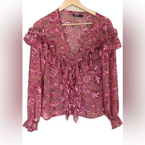 Nasty Gal woman’s pink and tan ruffled blouse size 6 long sleeve